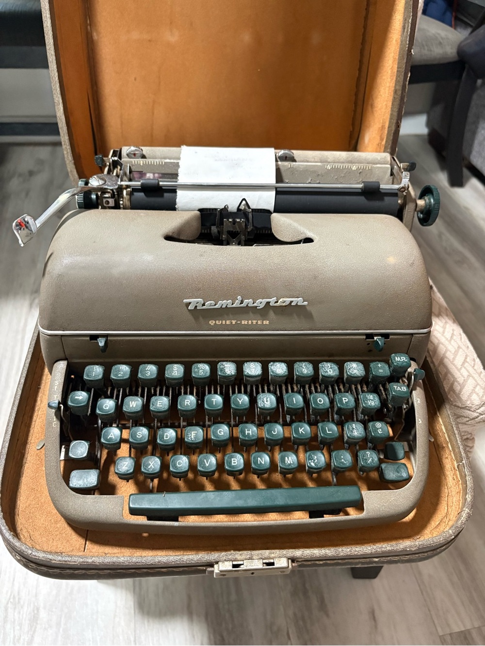 Remington portable typewriter in taupe with teal keys